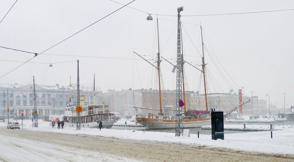 Helsinki Harbour in winter (photo credit Jill Browne) Two ships, one with three masts, in harbour in winter